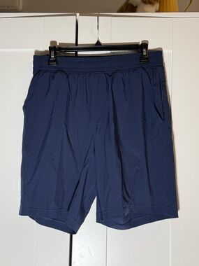 RHONE Navy Blue Athletic Shorts with Zip Pockets